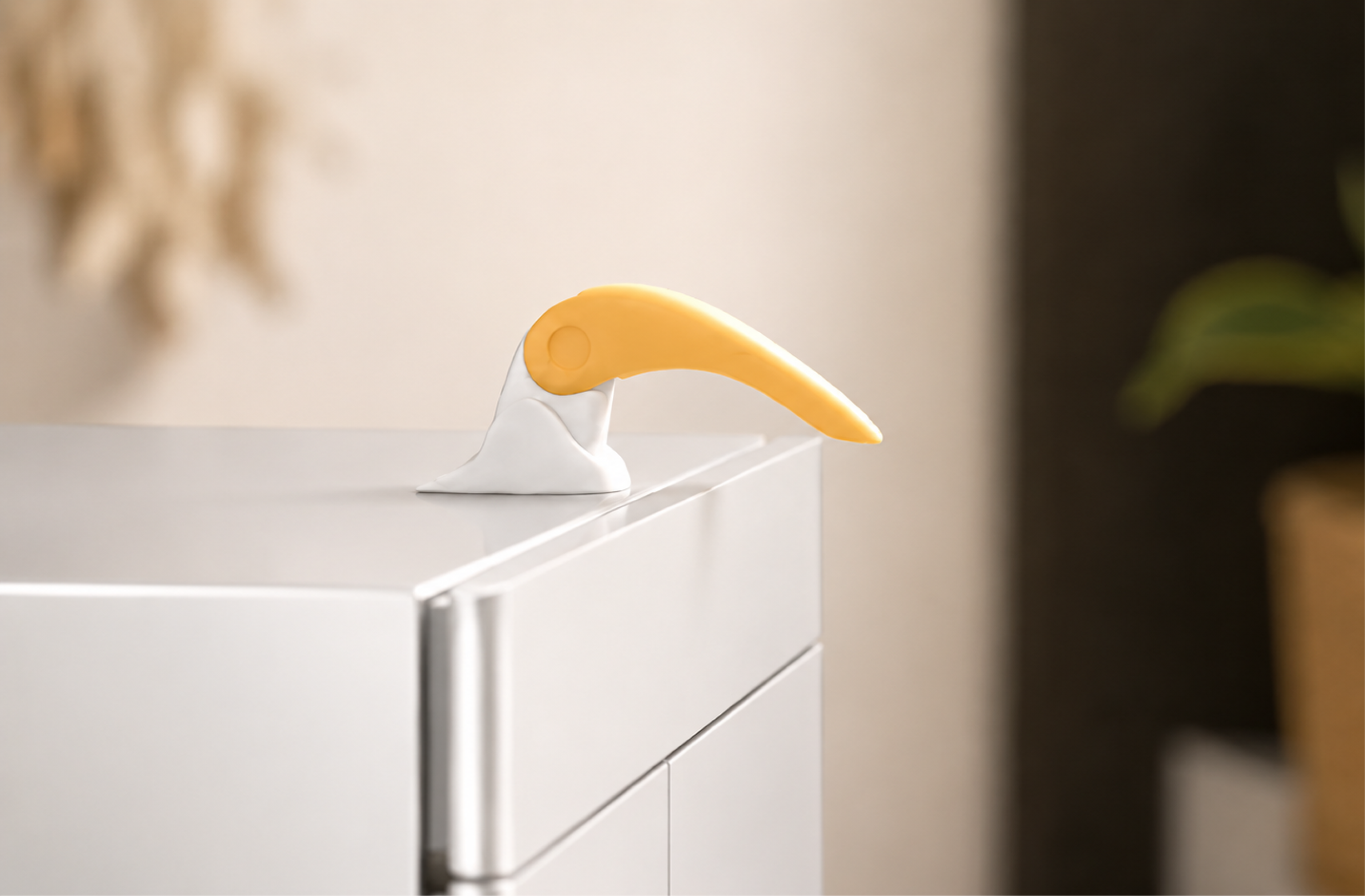 Foomie resting on a fridge in a warm kitchen